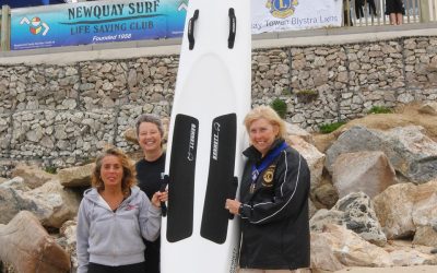 Lions present Newquay Lifesaving Club with new racing board