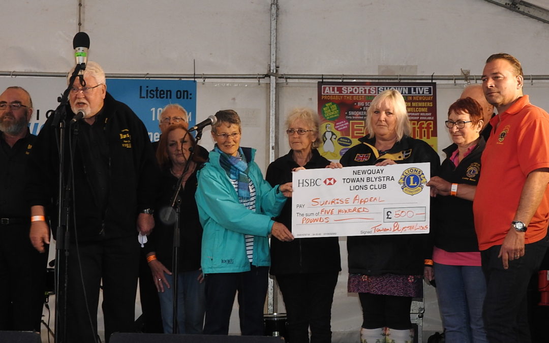 Cheque to Oll an Gwella to produce second charity CD